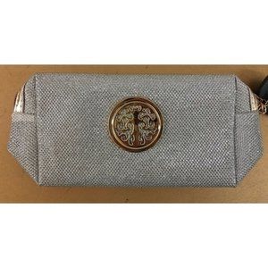 SILVER cosmetic bag with Gold emblem
